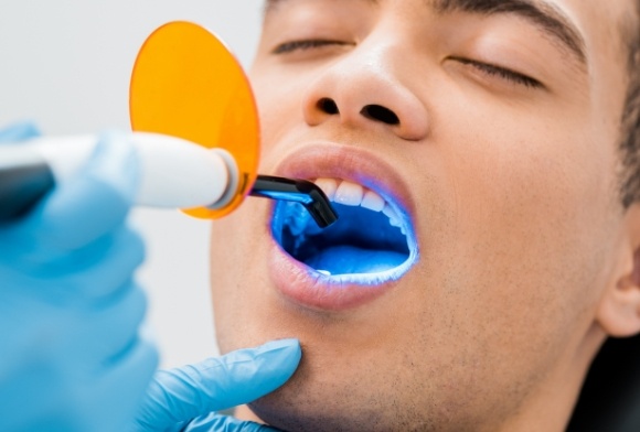 Patient receiving cosmetic dental bonding