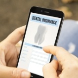 Dental insurance forms on smartphone screen