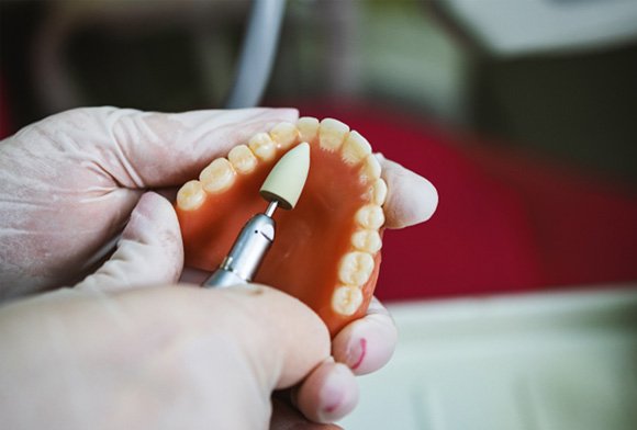 Close-up of dentures in Carrollton, TX being made