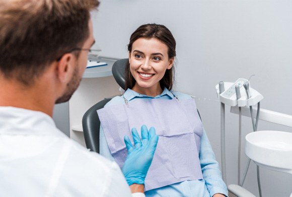 happy patient saving through the dental membership plan in Carrollton