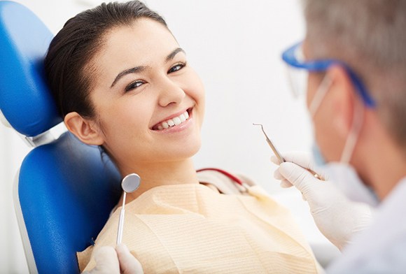 Young woman smiling during dental checkup