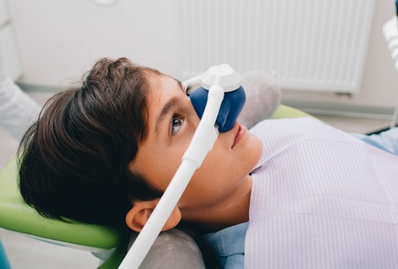 Patient receiving nitrous oxide dental sedation