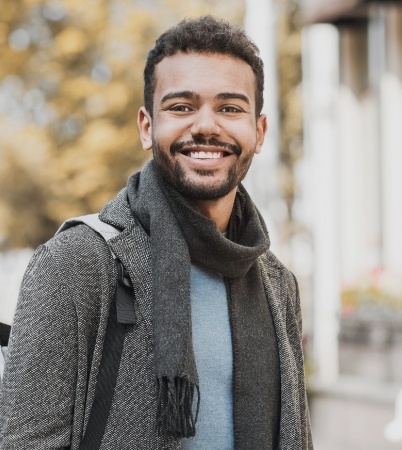 Man with healthy smile after restorative dentistry