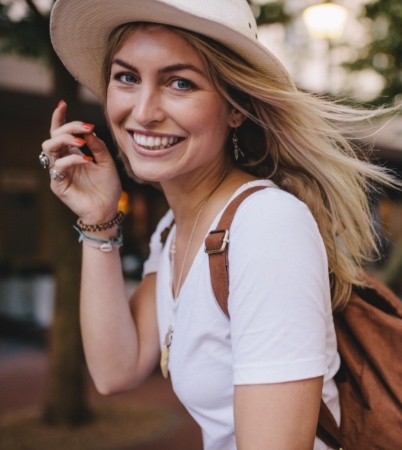 Woman sharing flawless smile after cosmetic dentistry