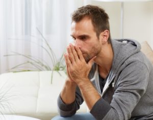 a man appearing to be very stressed