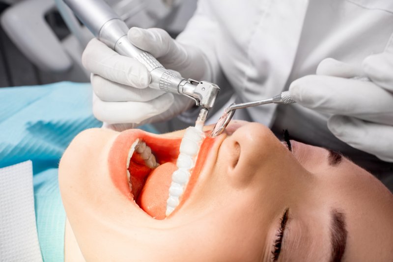 patient undergoing teeth cleaning in Carrollton